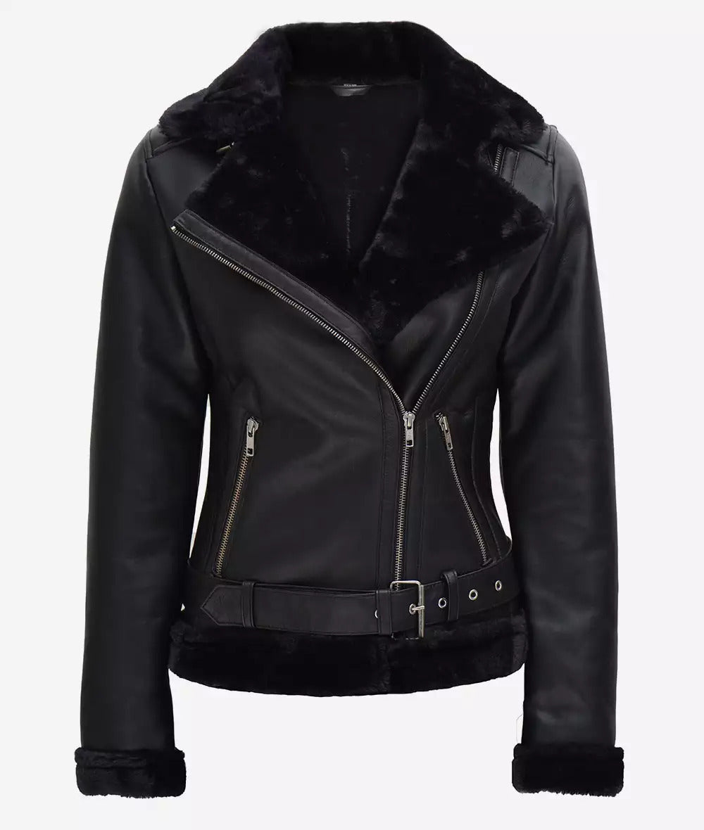 black shearling leather jacket for women, designer leather coat with shearling, luxury winter coats for women, fashion-forward black leather coat, women's tailored leather jacket, modern shearling coats, asymmetrical zip jacket.