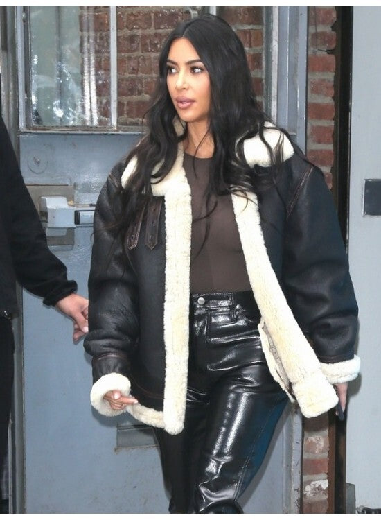 Kim Kardashian shearling jacket, black shearling leather jacket, celebrity-inspired leather jackets, oversized shearling coat, women’s fashion jackets, Kim Kardashian style jacket, luxury winter leather jacket, plush shearling lined jackets.