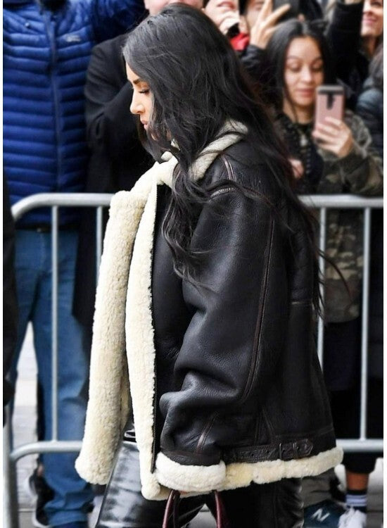 Kim Kardashian shearling jacket, black shearling leather jacket, celebrity-inspired leather jackets, oversized shearling coat, women’s fashion jackets, Kim Kardashian style jacket, luxury winter leather jacket, plush shearling lined jackets.