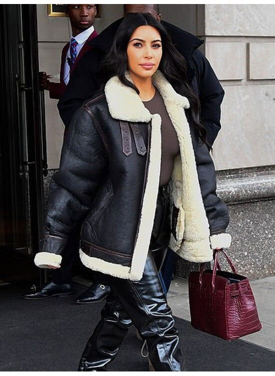 Kim Kardashian shearling jacket, black shearling leather jacket, celebrity-inspired leather jackets, oversized shearling coat, women’s fashion jackets, Kim Kardashian style jacket, luxury winter leather jacket, plush shearling lined jackets.