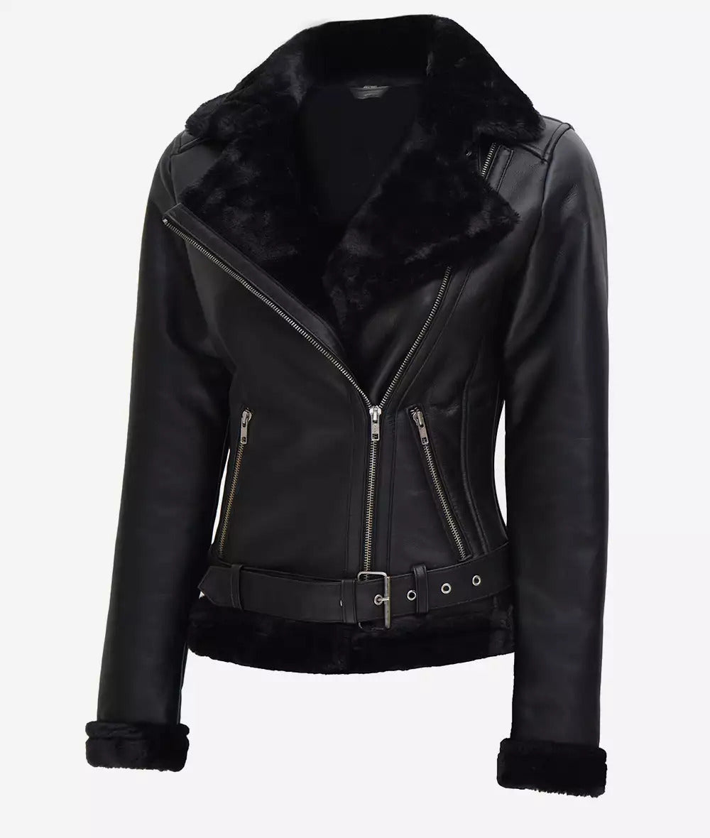 black shearling leather jacket for women, designer leather coat with shearling, luxury winter coats for women, fashion-forward black leather coat, women's tailored leather jacket, modern shearling coats, asymmetrical zip jacket.