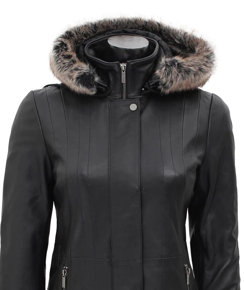 black leather long coat for women, women's shearling coat with hood, winter leather coat, stylish women's long coat, black shearling jacket, faux fur-lined leather coat, luxury winter coats for women, black long winter coat, elegant women's leather coat, leather shearling hooded coat.